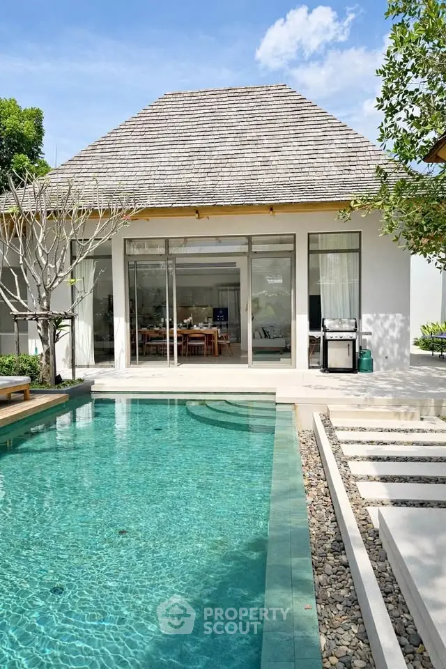 Luxurious villa with private pool and modern design, perfect for tropical living.