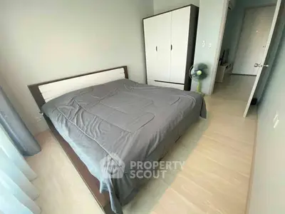 Cozy bedroom with modern furniture and natural light, perfect for relaxation and comfort.