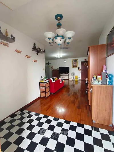 Spacious living room with wooden flooring and stylish decor