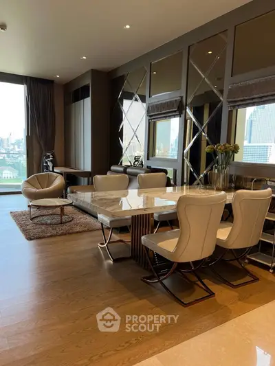 Luxurious living room with elegant dining area and stunning city view