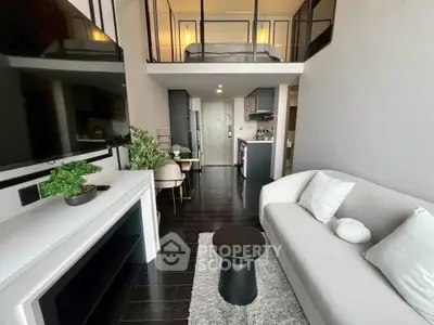 Modern loft apartment with open living area and stylish decor