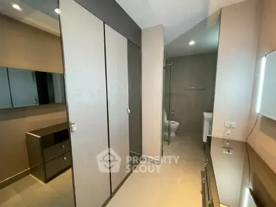 Modern bathroom with sleek design and ample storage space