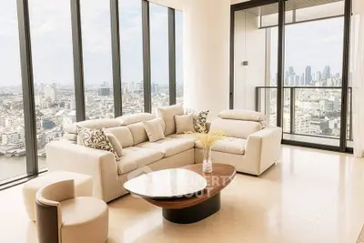 Luxurious living room with panoramic city views and elegant modern furniture.