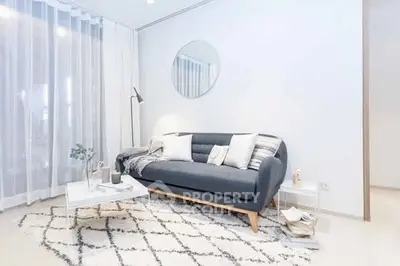 Stylish modern living room with cozy sofa and chic decor
