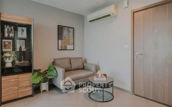 Cozy living room with modern decor and air conditioning