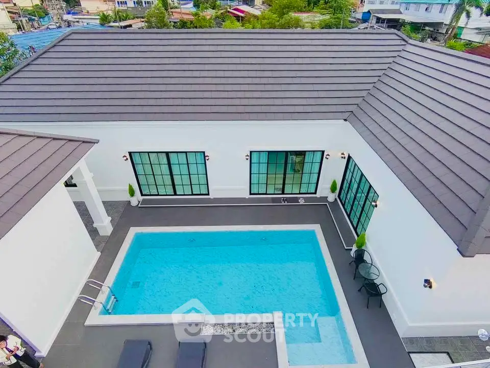 Luxurious modern home with private pool and sleek design