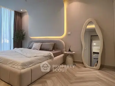 Luxurious modern bedroom with elegant lighting and stylish decor