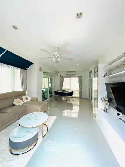 Spacious modern living room with elegant decor and natural light