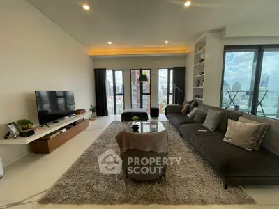 Luxurious living room with panoramic city views and modern decor