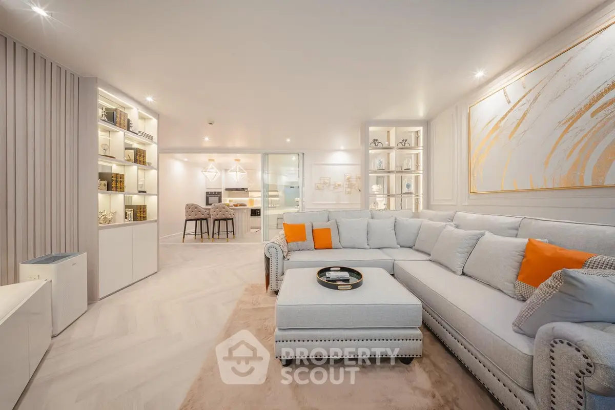 Luxurious modern living room with elegant decor and open kitchen layout