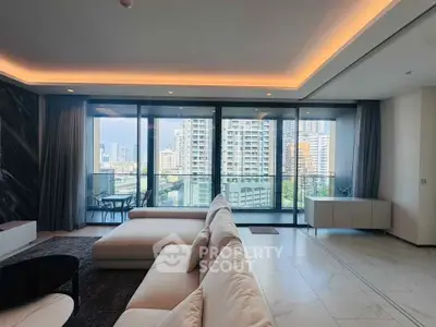 Luxurious living room with stunning city view and spacious balcony in modern apartment