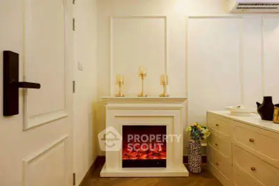 Cozy living room with elegant fireplace and stylish decor