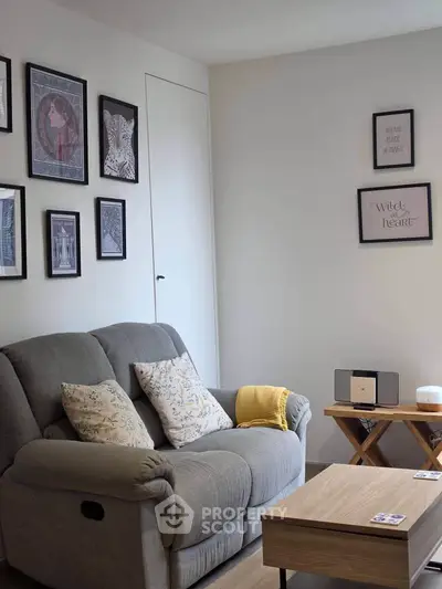 Cozy living room with stylish decor and comfortable seating, perfect for relaxation.