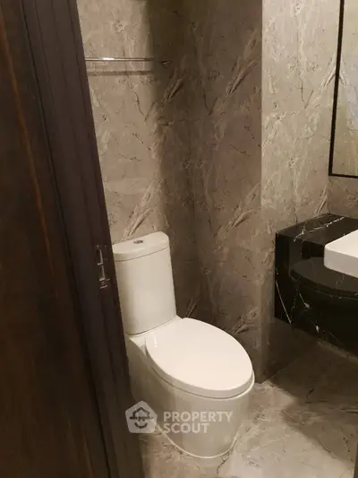 Luxurious marble bathroom with modern fixtures and elegant design
