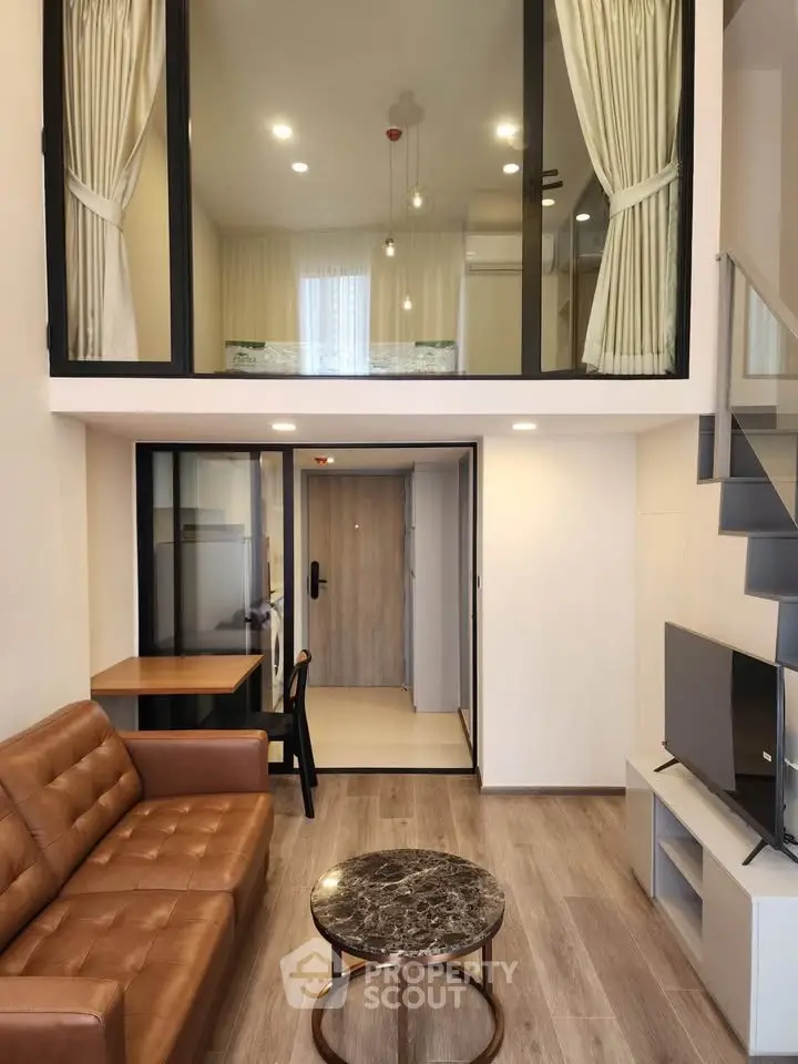 Modern loft apartment with stylish interior and mezzanine bedroom