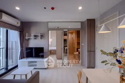 Modern living room with open layout and balcony access