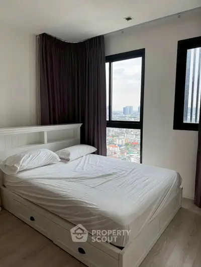 Modern bedroom with city view and stylish decor
