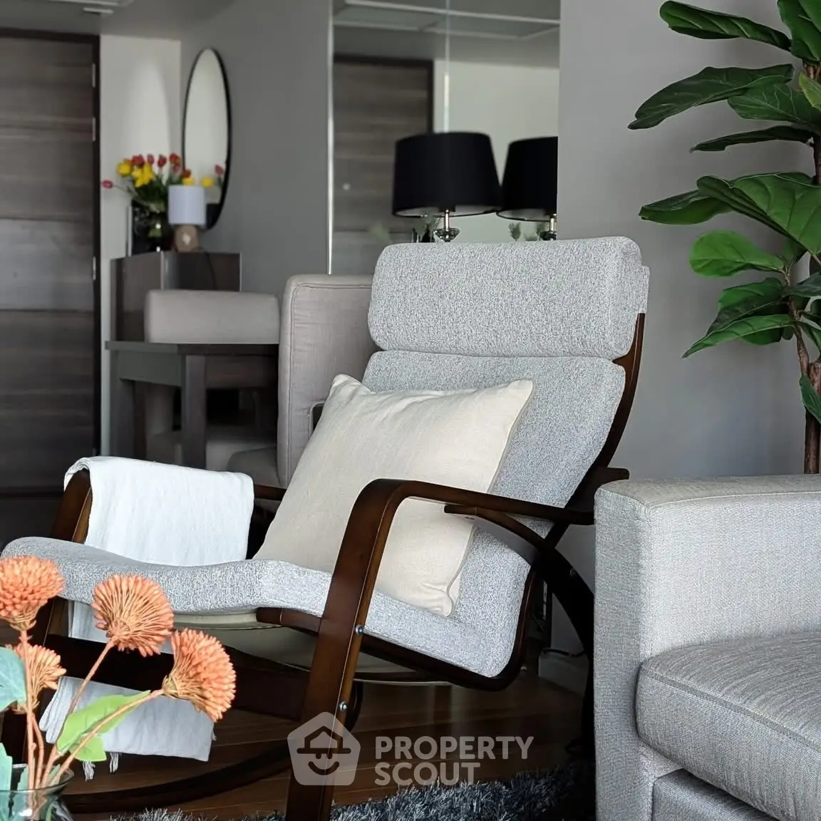 Stylish modern living room with elegant furniture and vibrant decor accents.