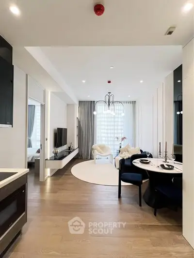 Modern open-plan living room with elegant dining area and stylish decor