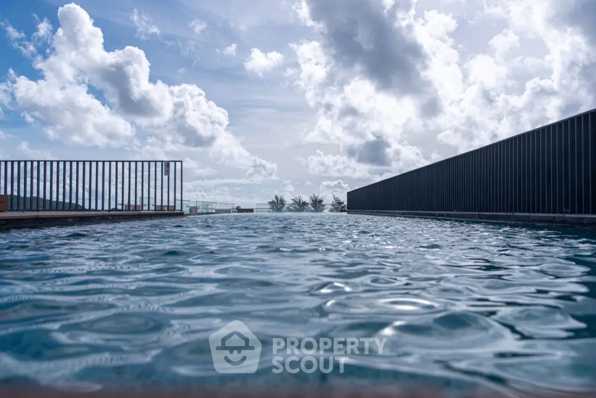 Stunning rooftop pool with panoramic sky views in luxury property.