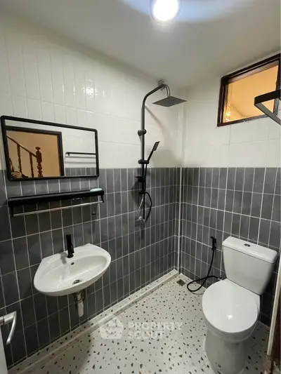 Modern bathroom with sleek fixtures and stylish tile design