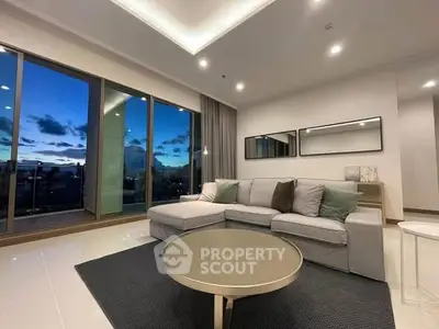 Luxurious living room with stunning sunset view and modern decor