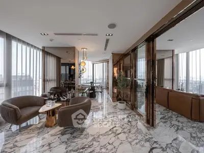 Luxurious modern living room with marble floors and panoramic city views