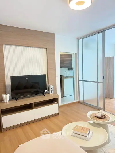 Modern living room with stylish decor and open kitchen layout