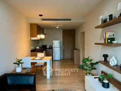 Modern open-plan living room with dining area and stylish decor
