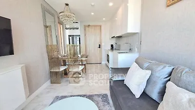 Modern living room with elegant dining area and chic decor