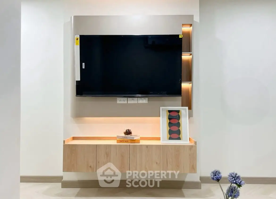 Modern living room with sleek TV unit and stylish decor