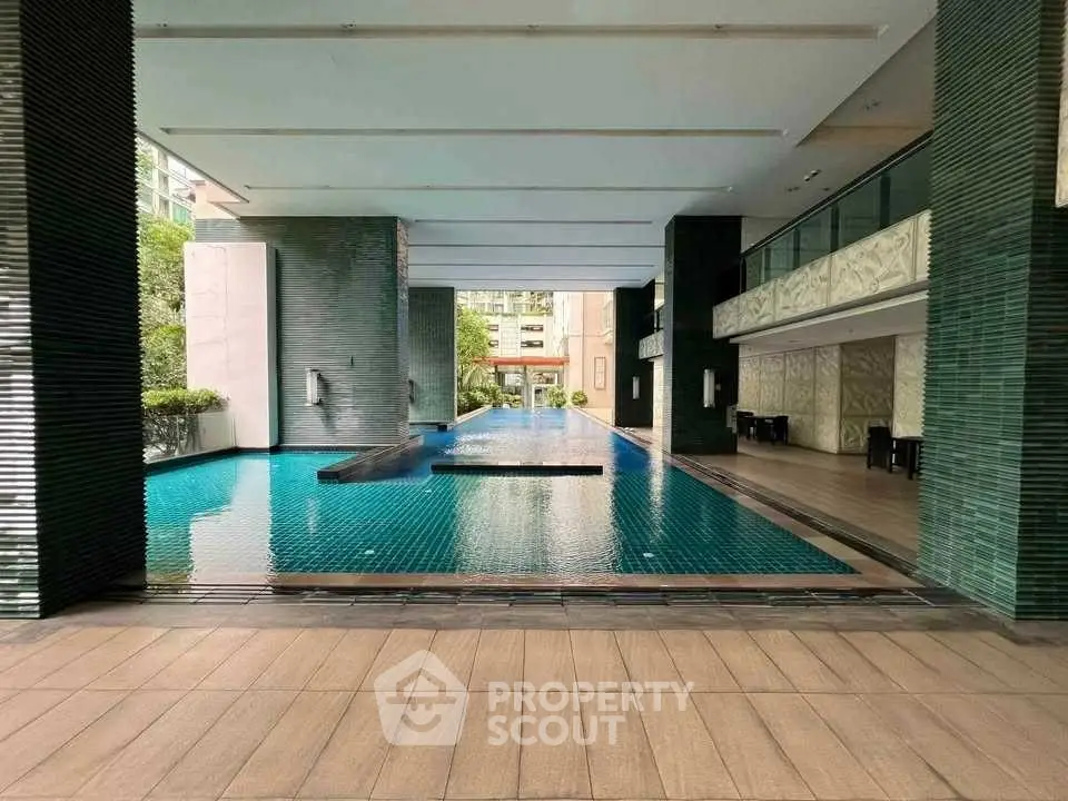 Luxurious indoor pool area with modern design and elegant finishes