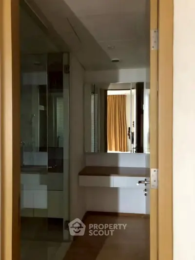 Cozy bathroom with modern fixtures and wooden accents