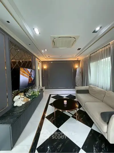 Luxurious living room with elegant decor and plush seating, perfect for relaxation and entertainment.