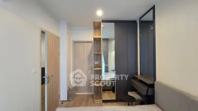 Modern bedroom with stylish decor and built-in storage solutions
