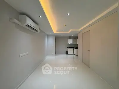 Modern minimalist apartment interior with sleek kitchen and ambient lighting