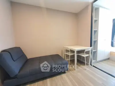 Modern minimalist living room with sleek furniture and natural light