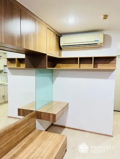 Modern study room with wooden shelves and air conditioning