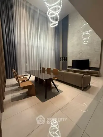 Luxurious modern living room with high ceilings and elegant lighting