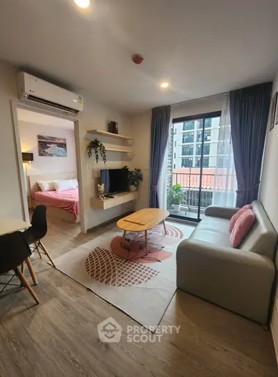 Modern living room with balcony view and stylish decor