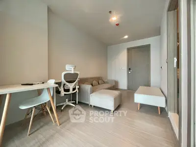 Modern minimalist living room with sleek furniture and neutral tones