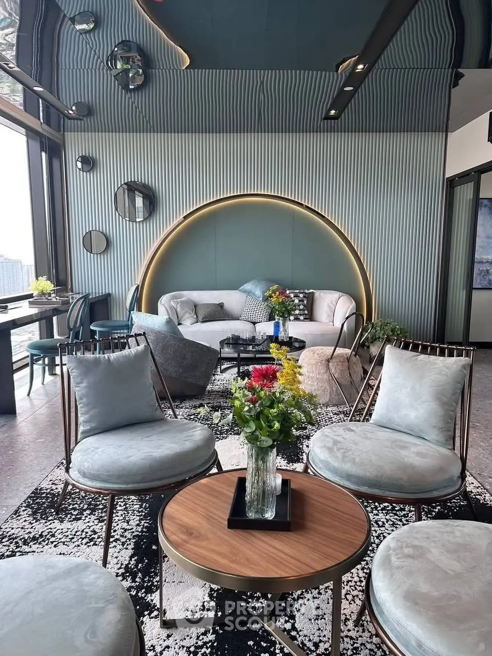 Luxurious modern living room with stylish decor and panoramic city views