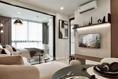 Modern open-plan living room with stylish decor and natural light