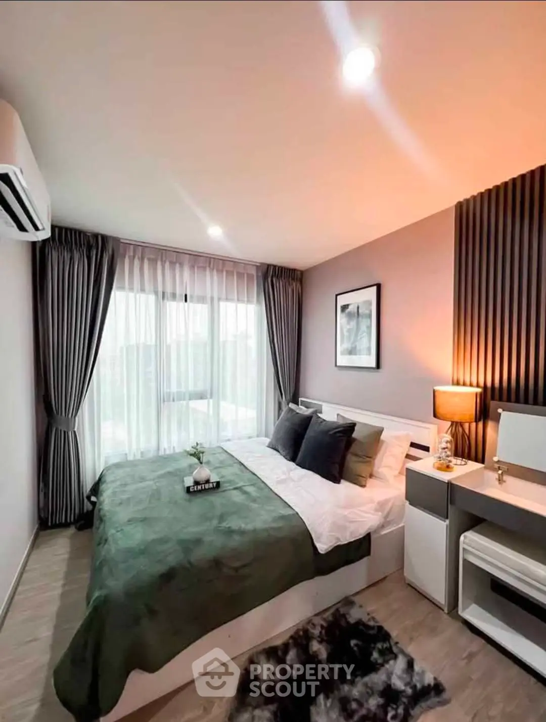 Modern bedroom with stylish decor and natural light