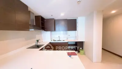 Modern kitchen with sleek cabinetry and open layout design