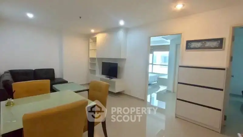 Modern living room with sleek furniture and open layout, perfect for urban living.