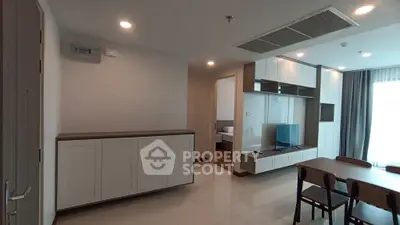 Modern apartment interior with open living area and stylish furniture