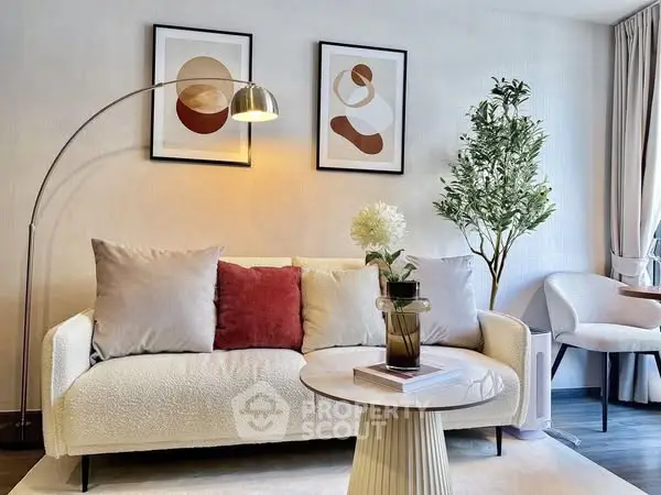 Stylish modern living room with cozy sofa and elegant decor