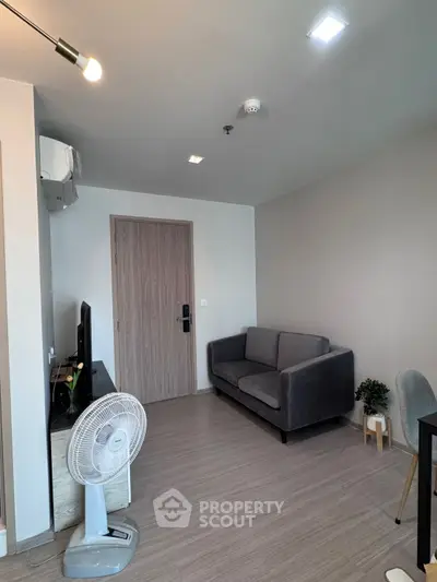 Modern living room with stylish furniture and neutral tones