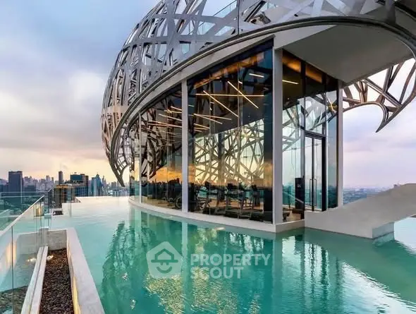 Stunning rooftop pool with panoramic city views and modern architectural design.